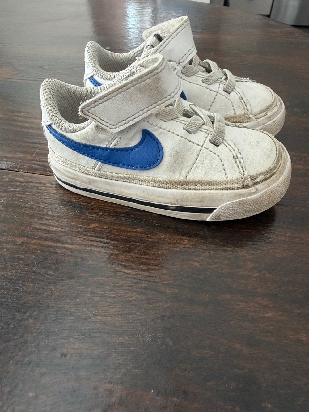 Nike Kids White Sneakers with Blue Swoosh and Velcro